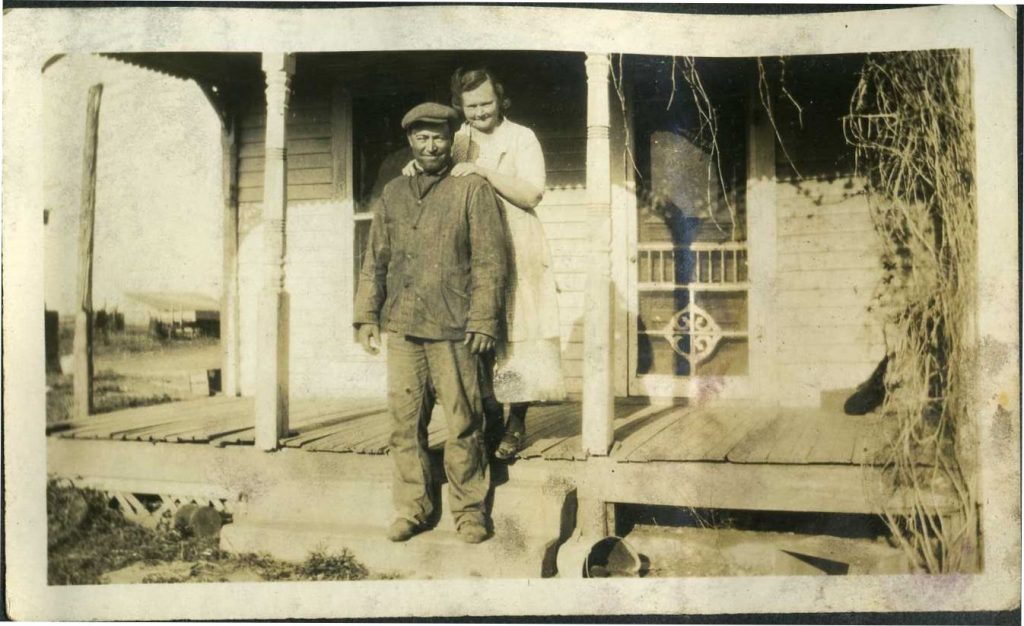 Roderick Porter and Myrtle Nyberg Stocking on the farm near Mayfield, Kansas